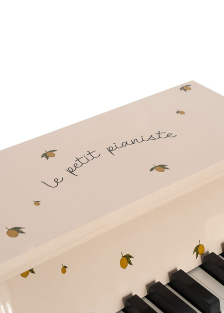 Konges Slojd Piano Glossy Lemon koop je bij Babywinkel
