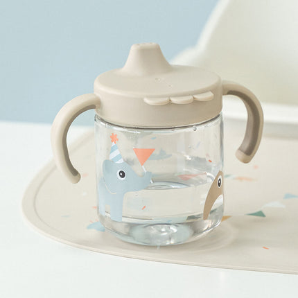 Leerbeker met tuit en handvatten Celebration Sand koop je bij Babywinkel