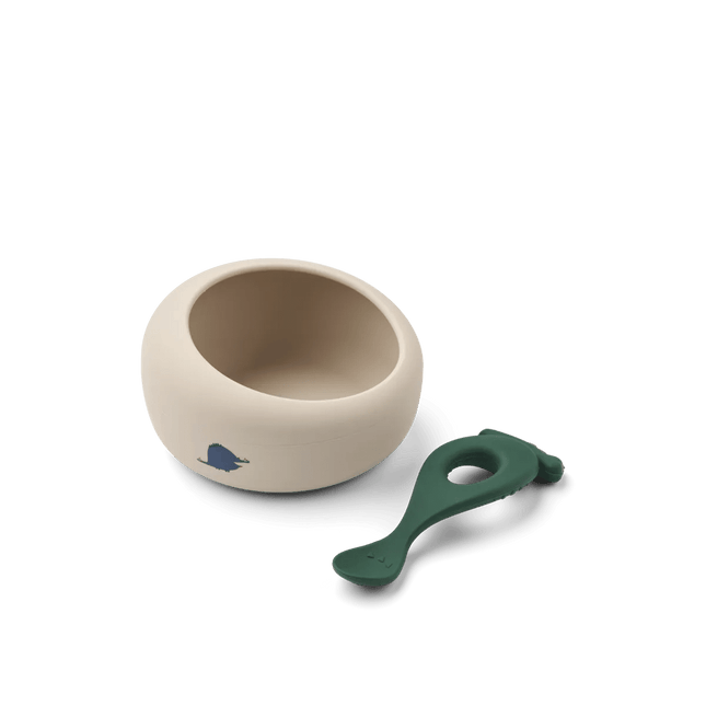 Liewood Baby Kom Sparia Dino Roar / Sandy Met Lepel koop je bij Babywinkel